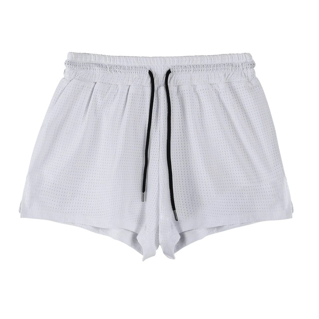 Men's quick-drying nylon shorts in black on a white background, showing mid-waist and short length.