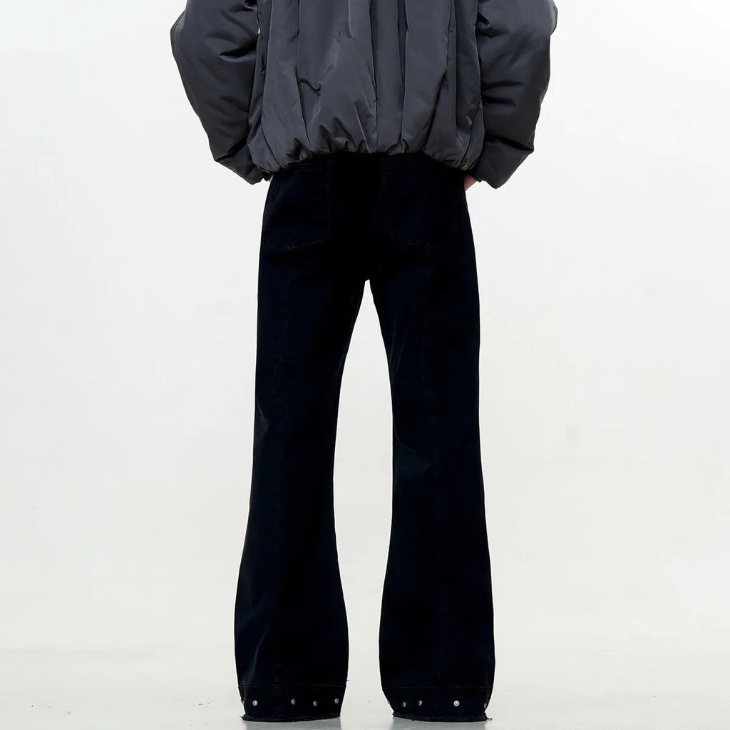 Straight-leg cotton jeans on a hanger, showing mid-waist fit, zipper fly, and horn-style leg opening.
