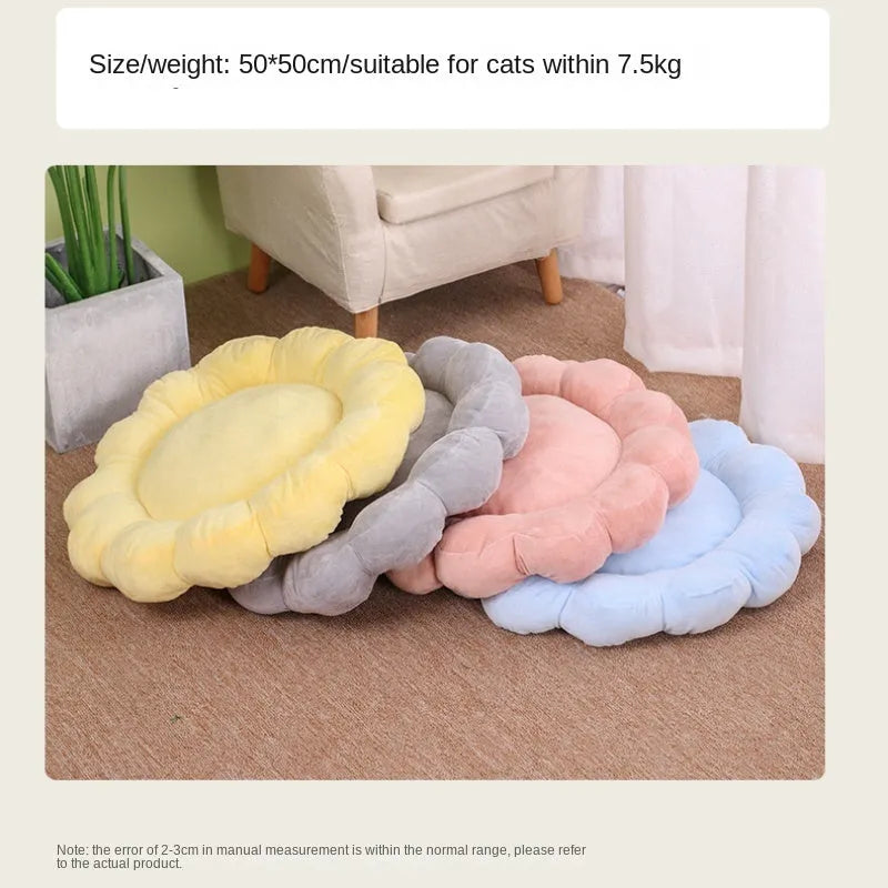 Blue half-surrounded petal-shaped pet bed for dogs and cats on a wooden floor
