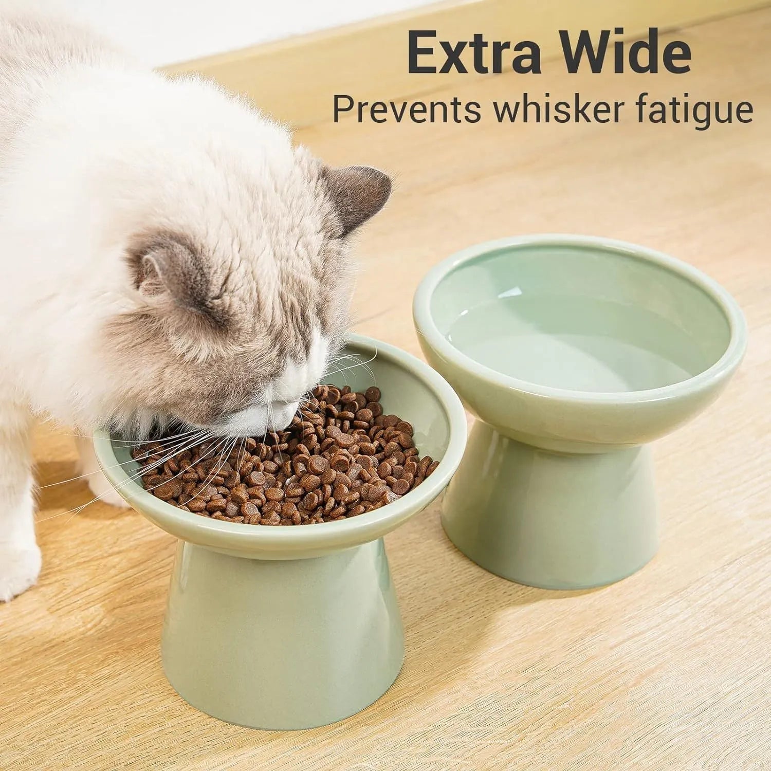 Ceramic elevated cat food bowl in blue colour with wide shallow design