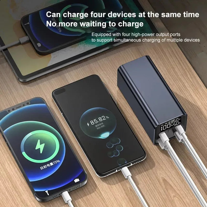 A black 65W high power laptop charging bank with a metal case, showing its dimensions.