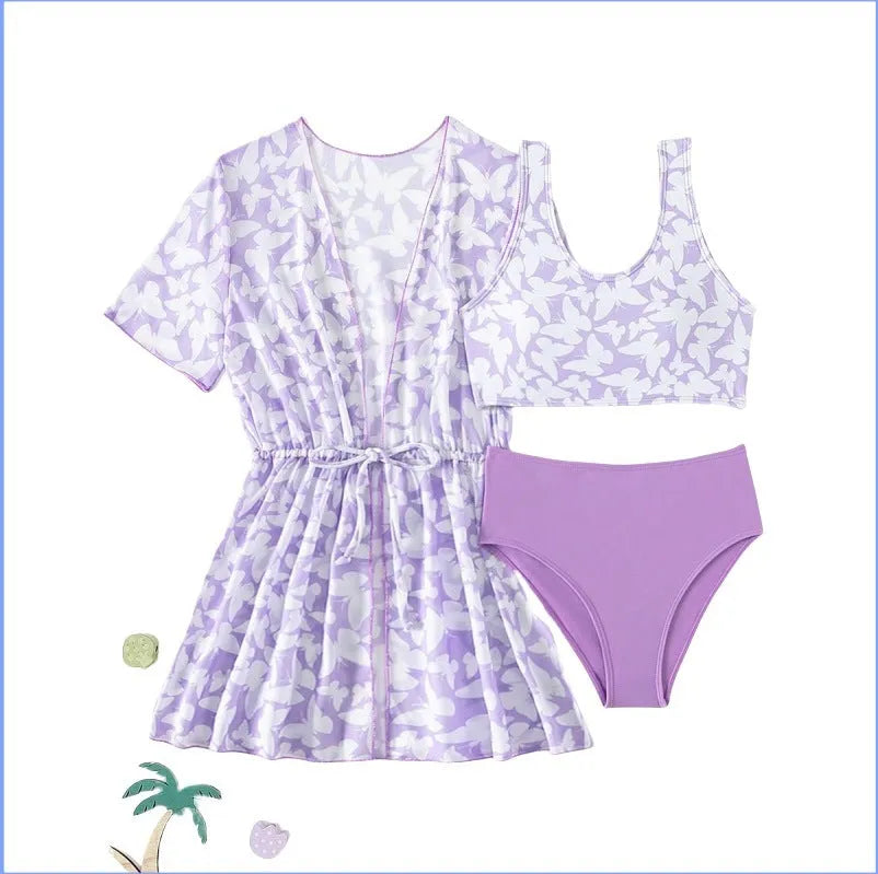 Three piece girls swimsuit set in colour 3218, showing coat, vest and pants.