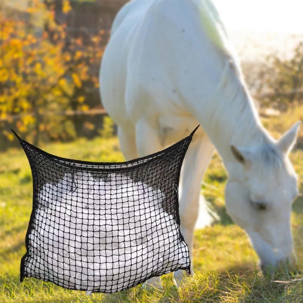 Black woven PE rope grid feeding bag hanging, sized for a horse.