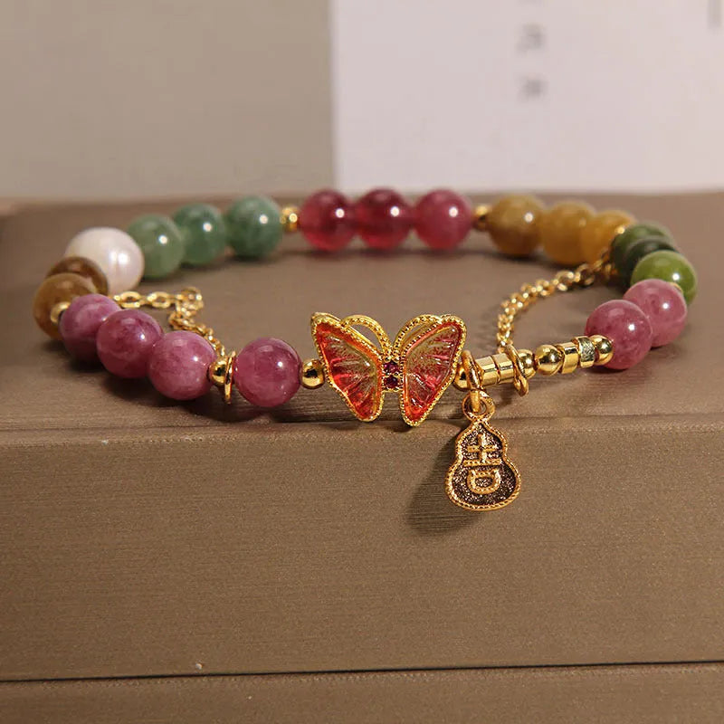 Natural jade coloured agate bracelet with butterfly-gourd tourmaline detail for women.
