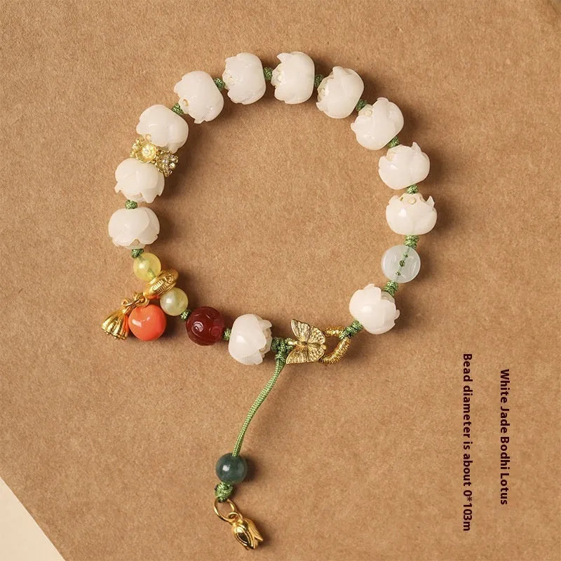White jade Bodhi bracelet with hand-woven rope, lotus beads, and large pumpkin beads on an open ring design.