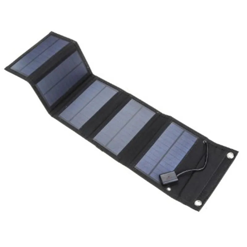 30W foldable solar charger with SunPower cells and dual USB outputs on camouflage fabric surface