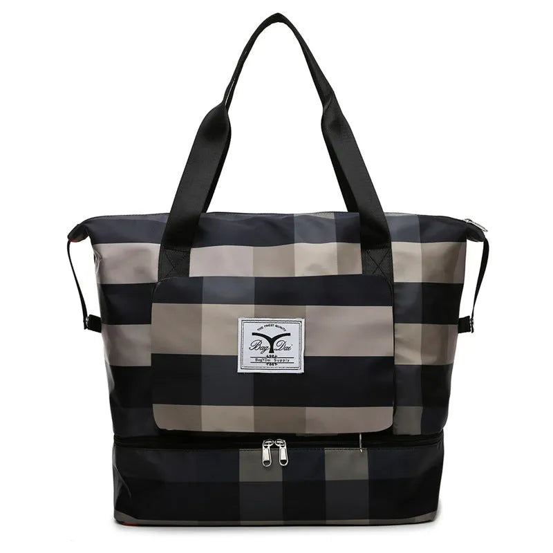 Foldable travel duffel bag in black with waterproof Oxford cloth, 20-35L capacity, and dry wet separation feature