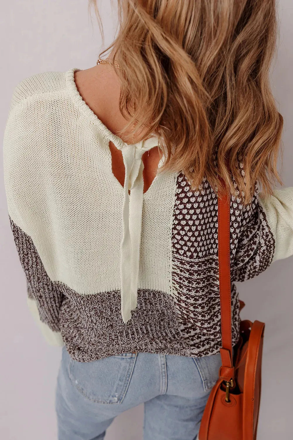 Dark khaki colour block loose sweater with drop shoulders and a back tie closure.