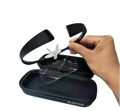 Head-mounted magnifying glass with large lenses on a black TR90 frame, shown with adjustable nose pad.