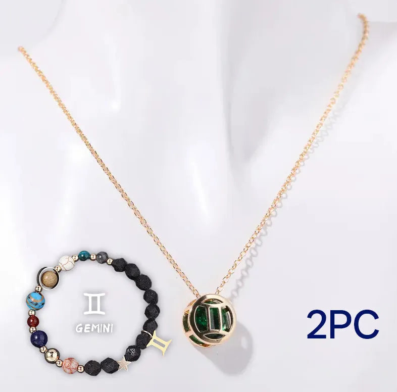 A natural stone beaded necklace and matching bracelet set laid flat, showing the textured stone beads.