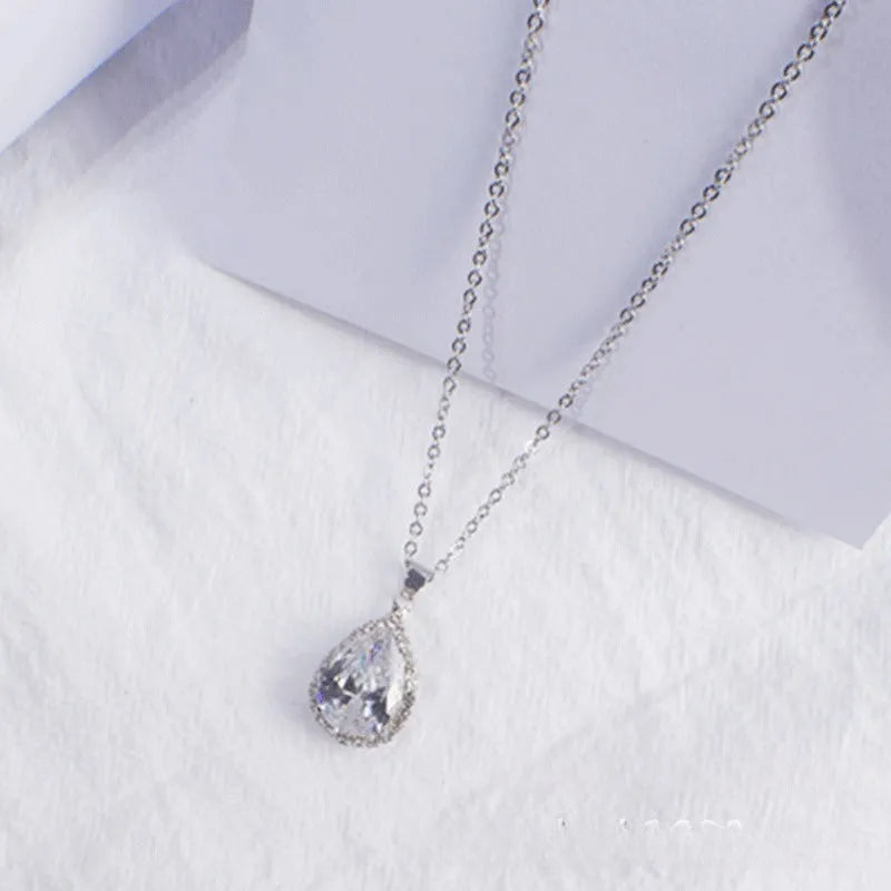 Geometric rhinestone water drop necklace in rose gold electroplated finish