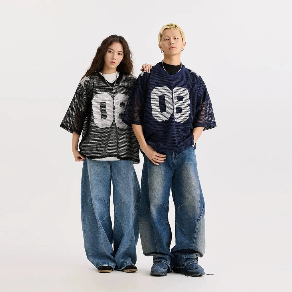 Black loose fit pullover top with white letter pattern and short sleeves