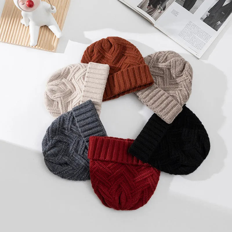 Wool knitted dome crown hat for women in one of six colours: ivory white, khaki, red, brown, grey, or black.