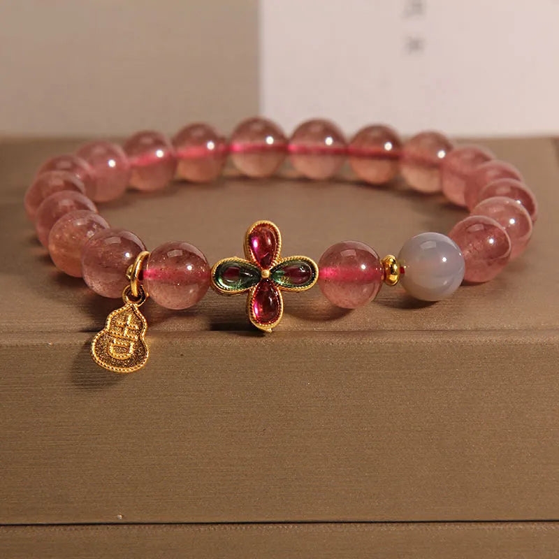 Natural strawberry quartz bracelet for women with four-leaf clover and calabash pendant on alloy chain with rhinestone accents