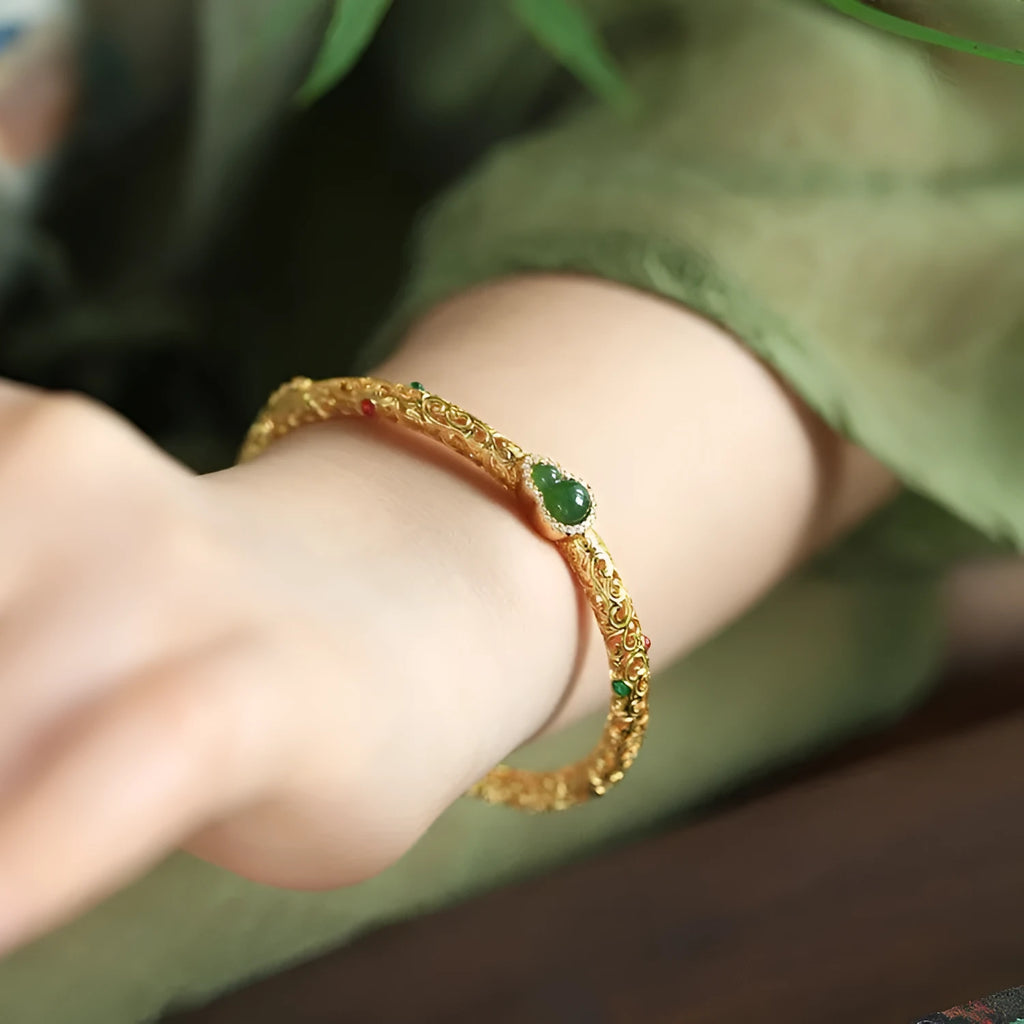 Gold-plated copper xiangyun gourd bracelet with adjustable silk cord for women