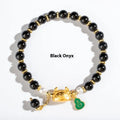 Handmade natural agate bracelet with dragon zodiac charm and 8mm round beads.