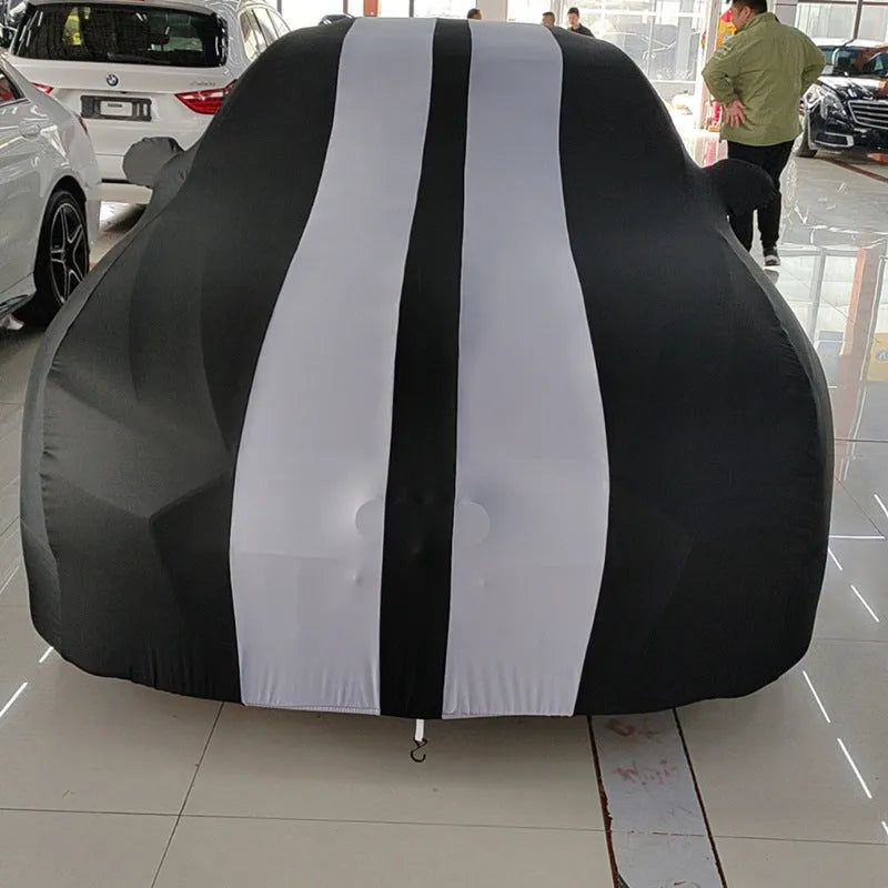 Ford Mustang elastic car cover in light grey colour stretched over vehicle showing four-side elastic edges