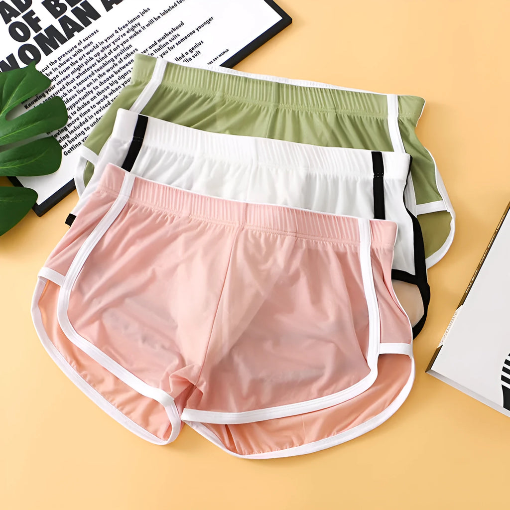 Men's ice silk mesh boxer shorts in a low waist design, shown in various colours including black, white, and army green.