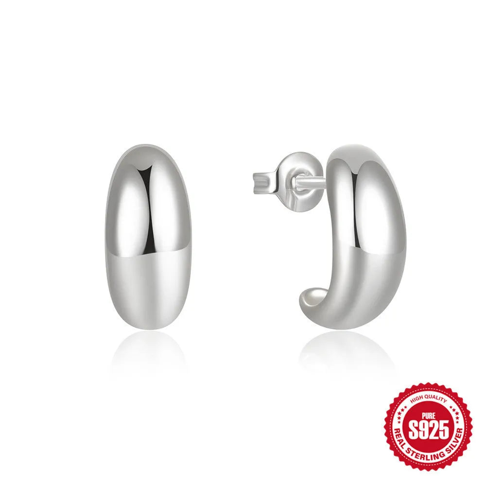 Sterling silver C-shaped stud earring with glossy electroplated gold finish