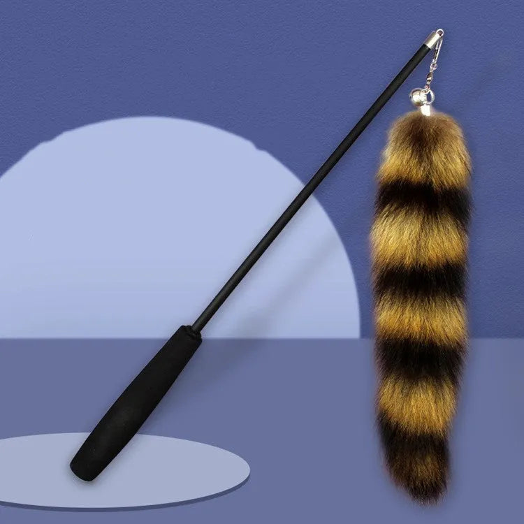 Black cat toy wand with elastic string and feather attachment for interactive feline play