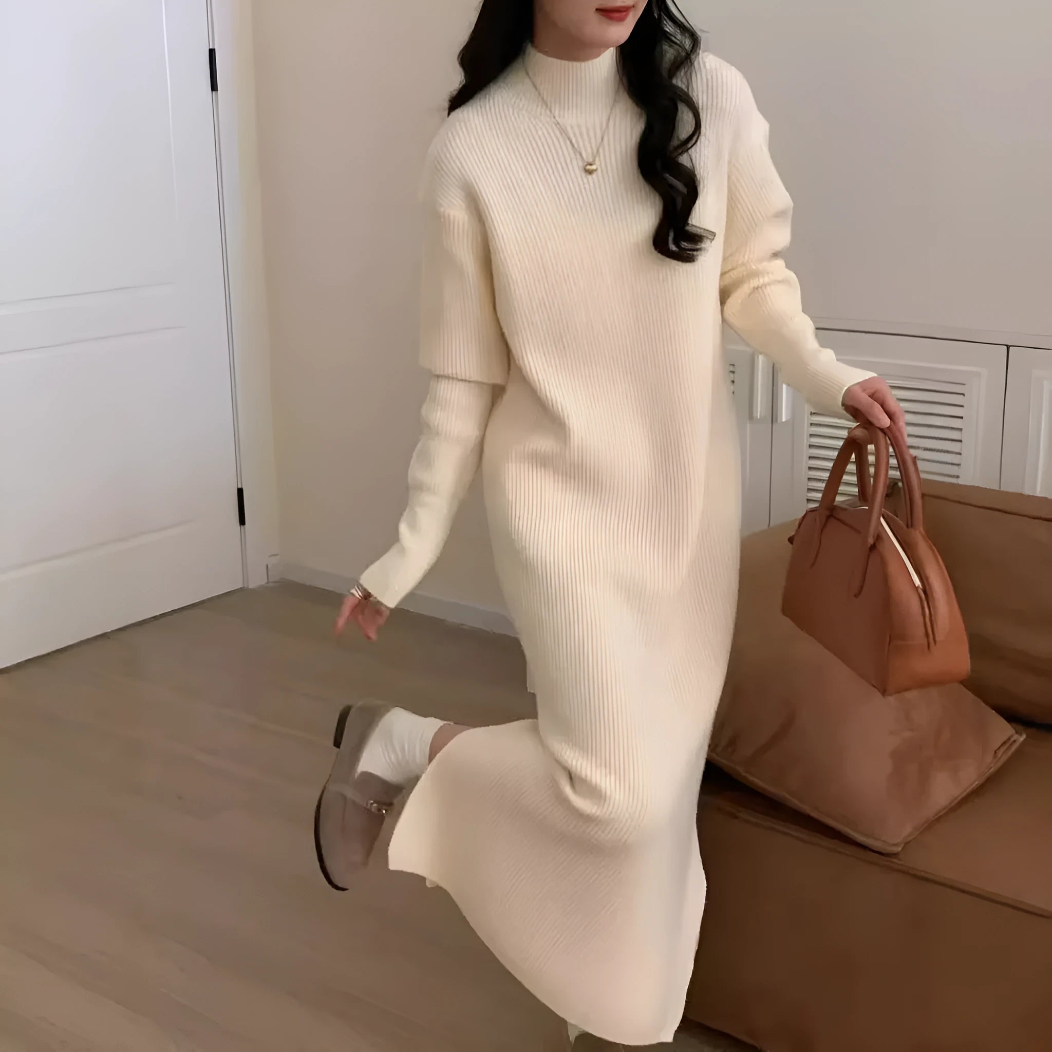 Acrylic knitted dress with half turtleneck, high waist, and midi length in solid colour