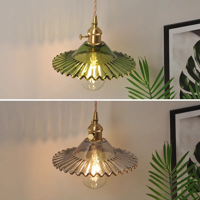 Retro copper wall lamp with a glass shade in a choice of six colours on a wall.