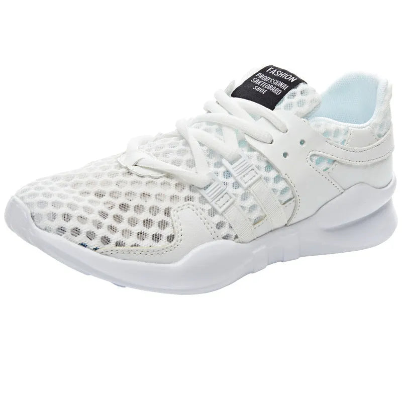 Breathable hollow out mesh casual sneakers in black and white colours with round toe design