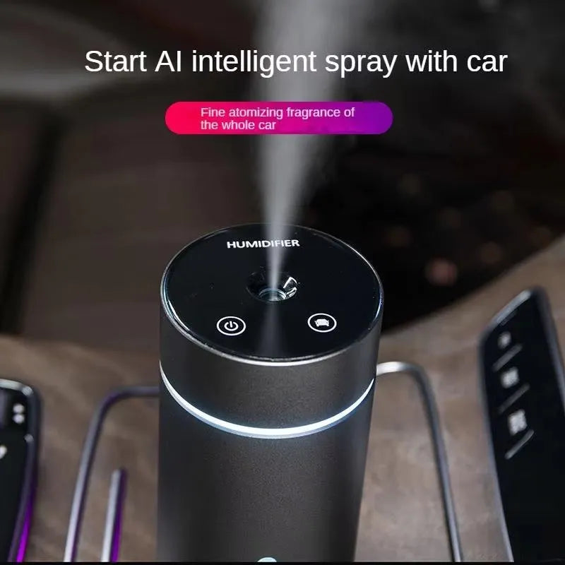 Black portable car humidifier and essential oil diffuser with aluminium body and colourful night light on