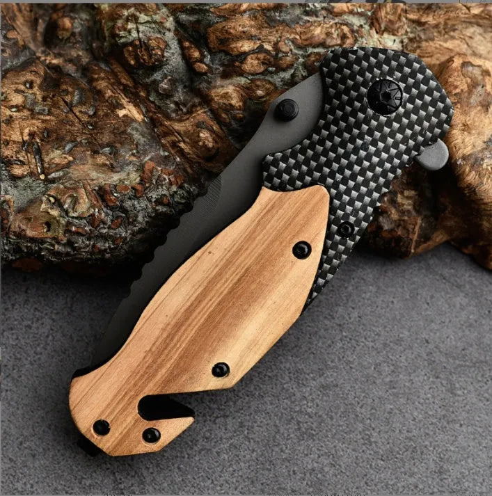 Folding camping knife with sandalwood handle, open 9cm stainless steel blade showing Laser Damascus pattern