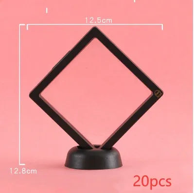 3D floating display case holding coins and jewellery between transparent membrane sheets