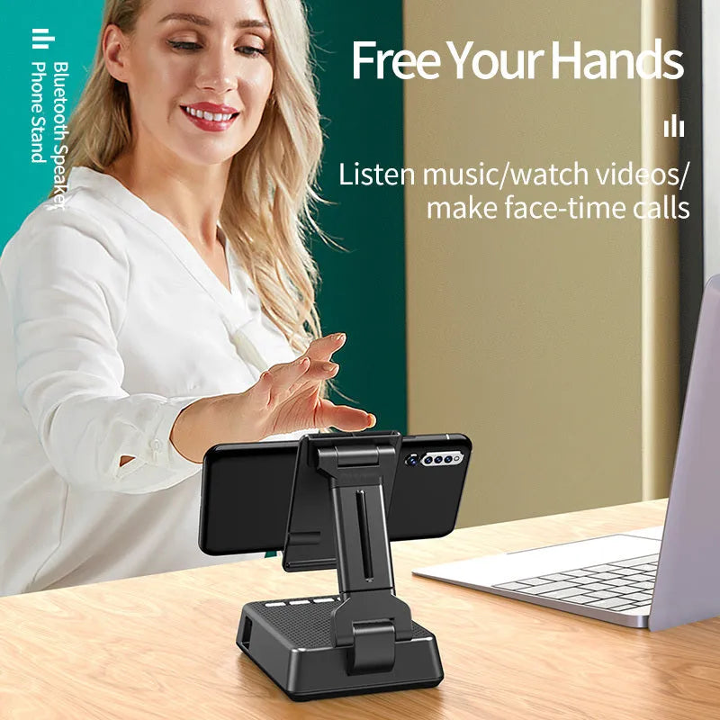 Black mobile phone broadcasting stand with Bluetooth speaker and microphone on desk
