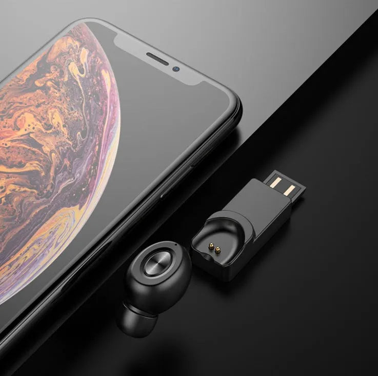 True wireless Bluetooth headset with magnetic charging base in black and white styles