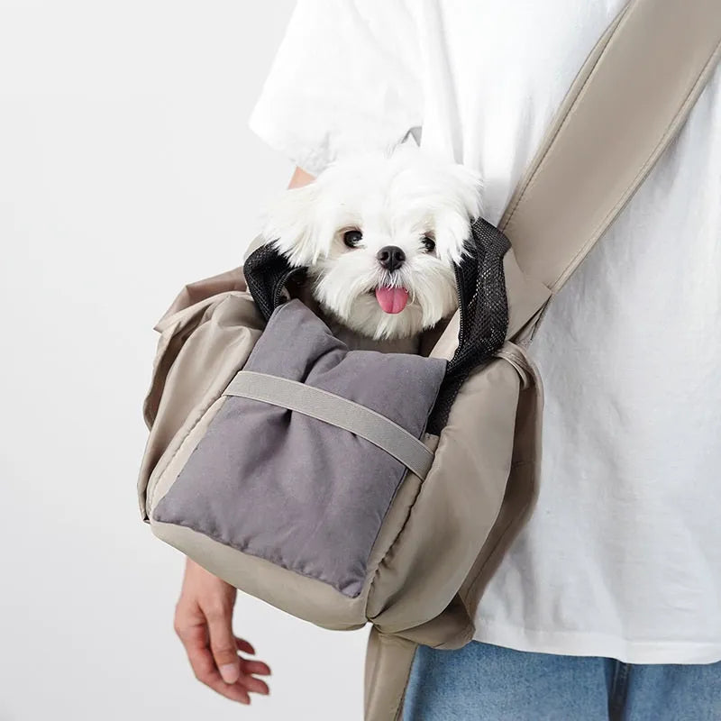Apricot coloured cloth pet handbag with dimensions 41cm by 16cm by 28cm