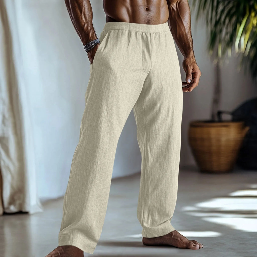 Straight leg casual trousers in cotton and linen fabric, shown in light green colour with side pockets.