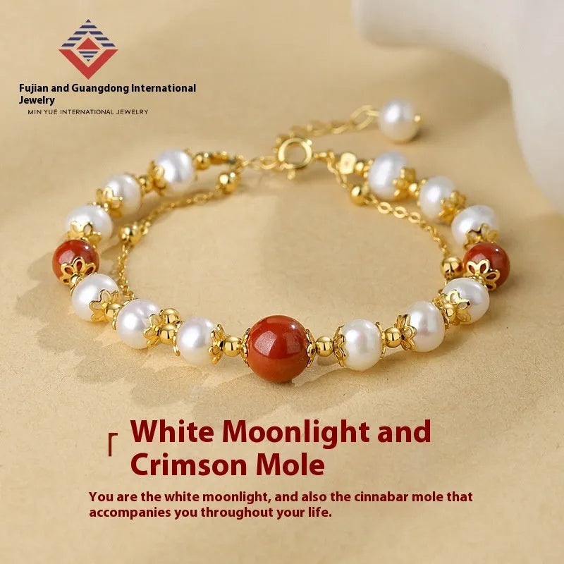 Sterling silver double-layer bracelet with white freshwater pearls and cinnabar red beans