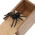 A closed wooden prank scare box measuring 9.1 cm, with a random lifelike animal inside ready to jump out.