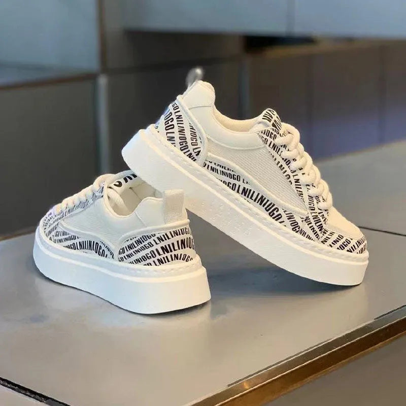 Men's white canvas board shoes with thick rubber sole and low heel, shown in white, black, grey, and green colour options.