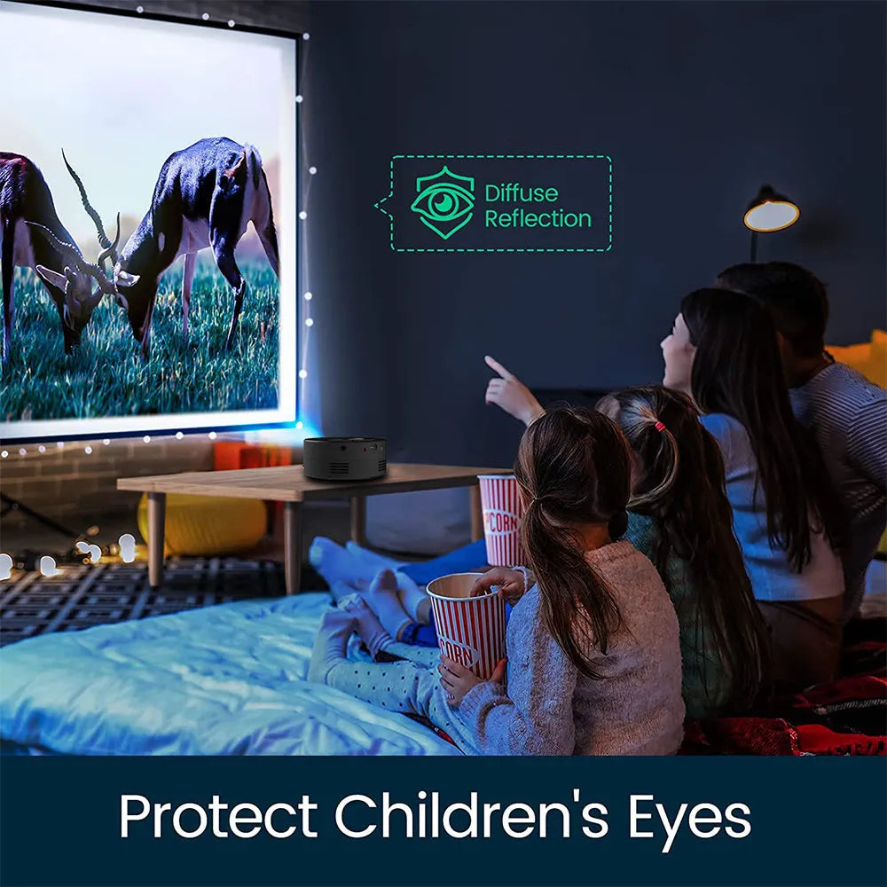 Black mini portable children's projector for mobile phone connection.