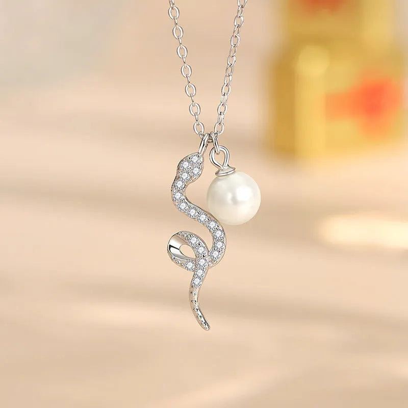 925 silver animal pendant necklace with platinum rose gold colour and Oring chain on a white background