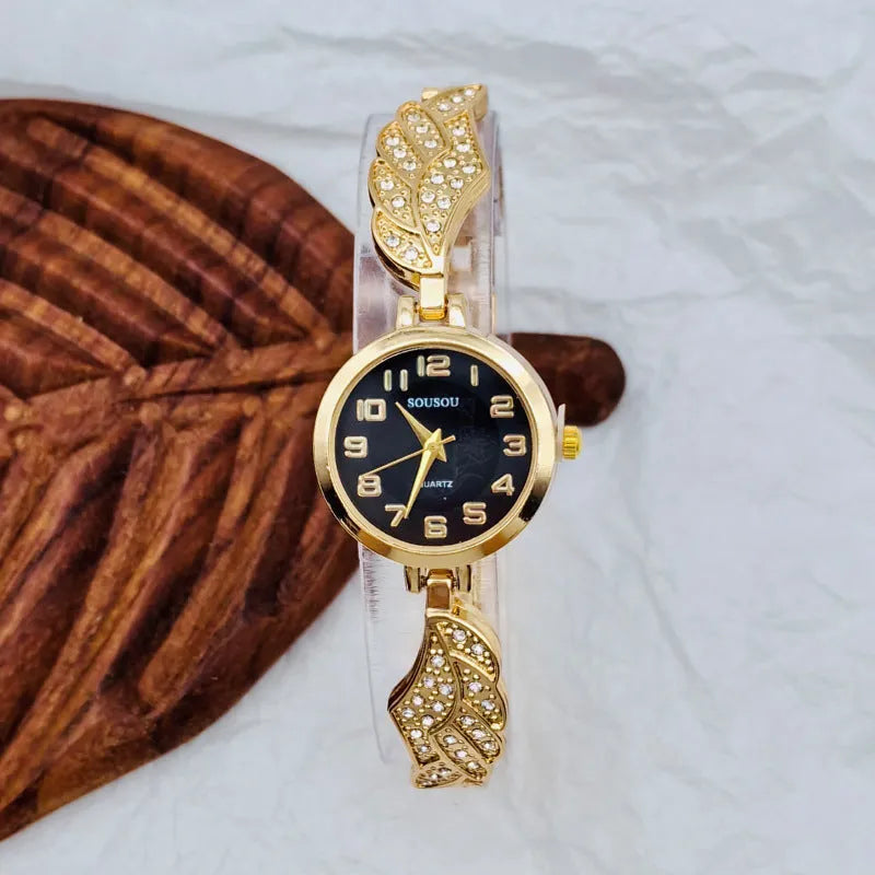 Stainless steel women's wristwatch with round dial on a metal bracelet with Vachette clasp.