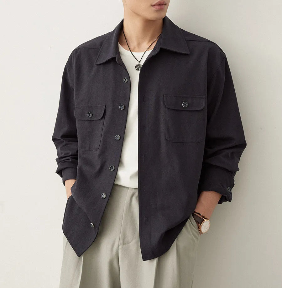 Men's casual shirt with a cotton lapel in light sand rice colour, showing long sleeves and simple design.