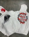 Black hooded sweatshirt with white skull print and rhinestone details in loose cardigan style