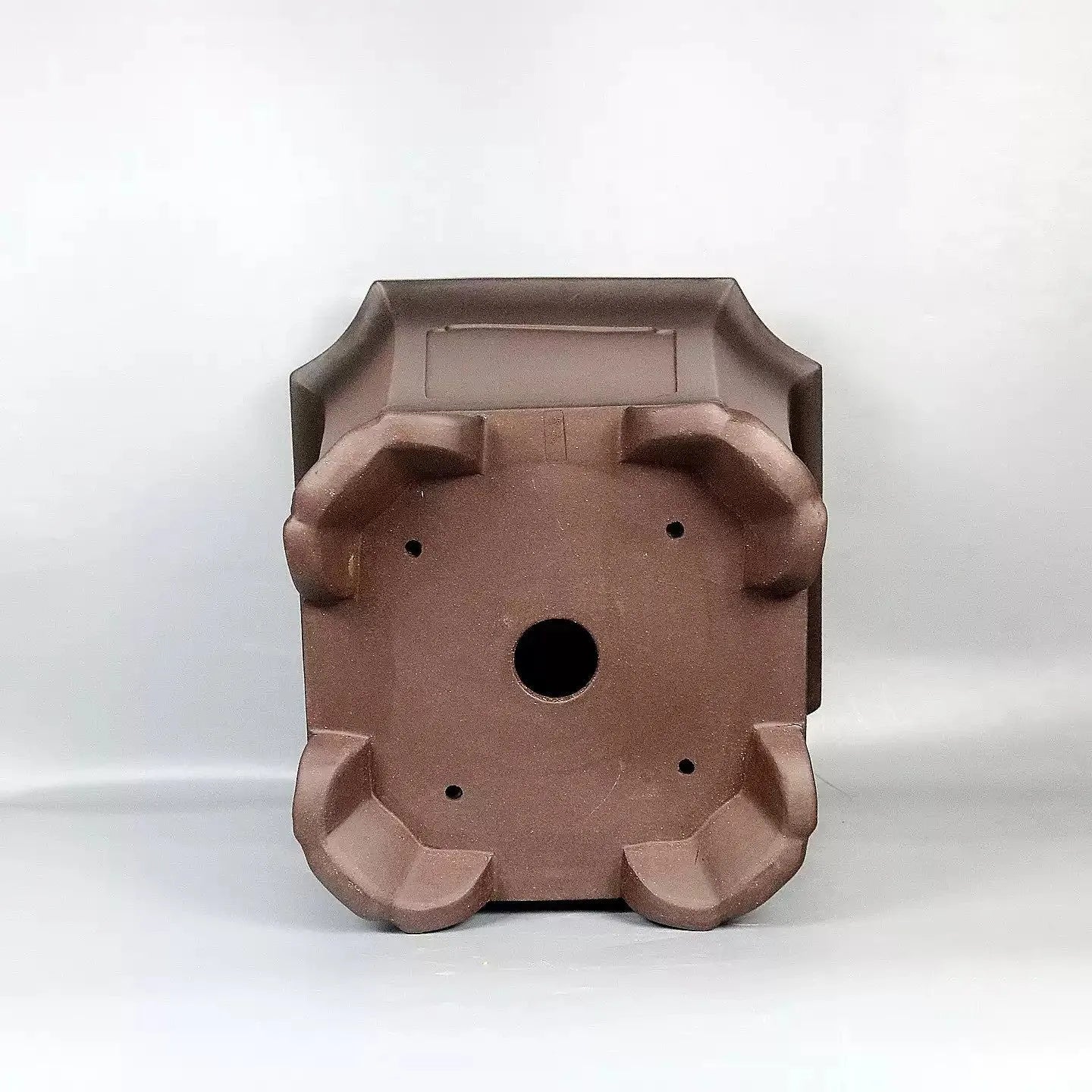 Ceramic antique redware flowerpot purple sand finish 40x40x40cm on a wooden table