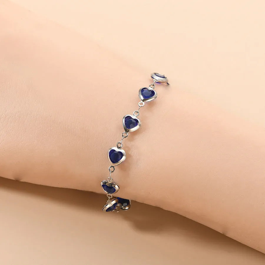 Devil's Eye geometric heart bracelet in stainless steel showing colourful electroplated finish