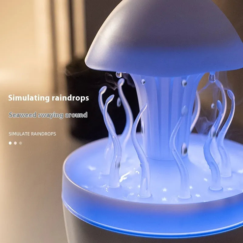 Rotating water drop aroma diffuser column humidifier with colourful LED lights in marble gold finish