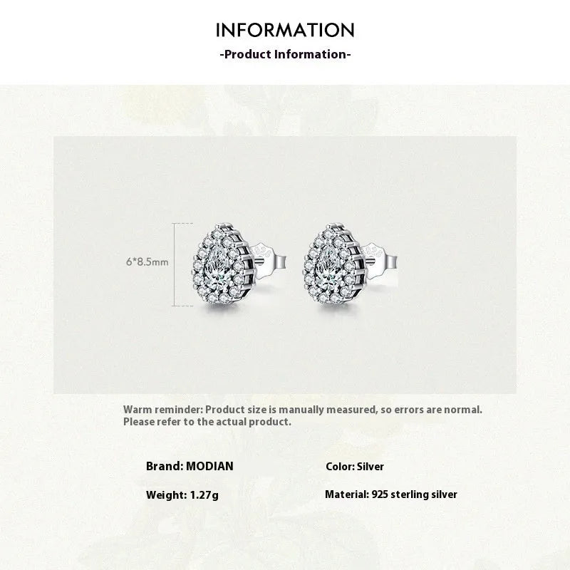 Women's silver water drop shaped ear studs made from 925 sterling silver with diamond treatment