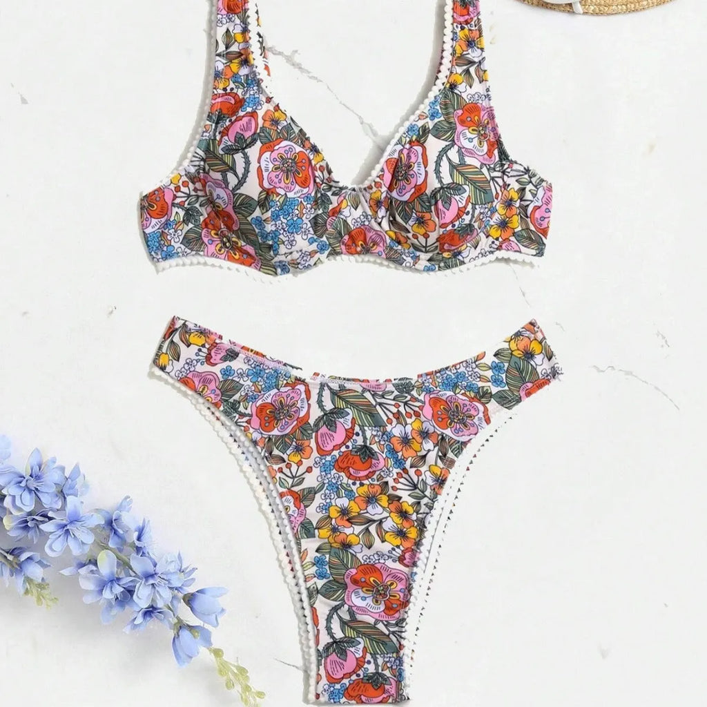 Women's floral print bikini with steel bracket push-up and tied sides, shown in high-waist briefs style.