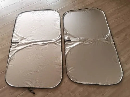 Silver aluminium foil car sunshade shown in two size options.