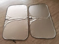 Silver aluminium foil car sunshade shown in two size options.