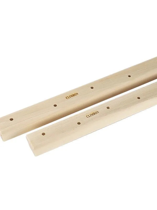 Set of three solid wooden grip strength training hangboards in different sizes on a grey background.